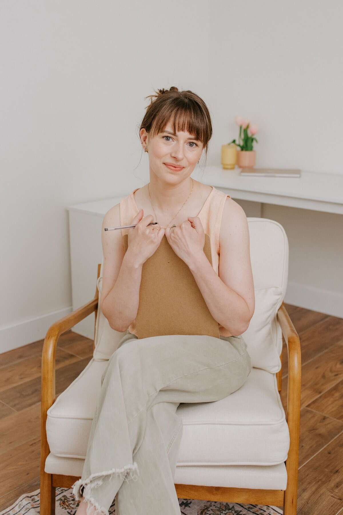 Woman Seated In Minimalist Room Practitioner Chelsea Stenner Therapy And Online Counselling Chilliwack Bc